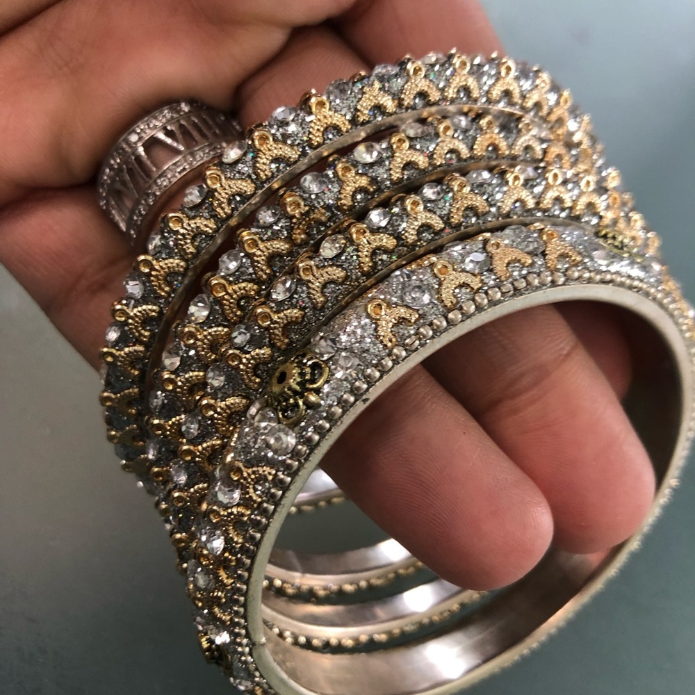 Four piece bangle set.